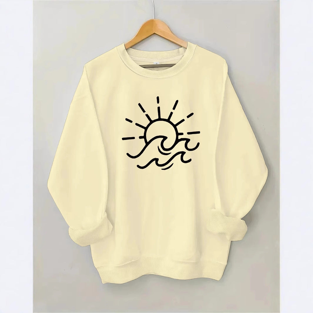 Dame sweatshirt med kreativ sol- og bølgedesign Skjora