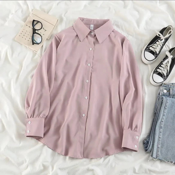 Kvinnens elegante bluse med voluminøse ermer Skjora