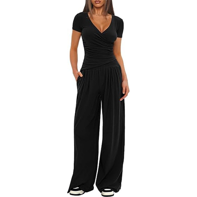 Dame avslappet jumpsuit med omslagsdesign og vid ben Skjora