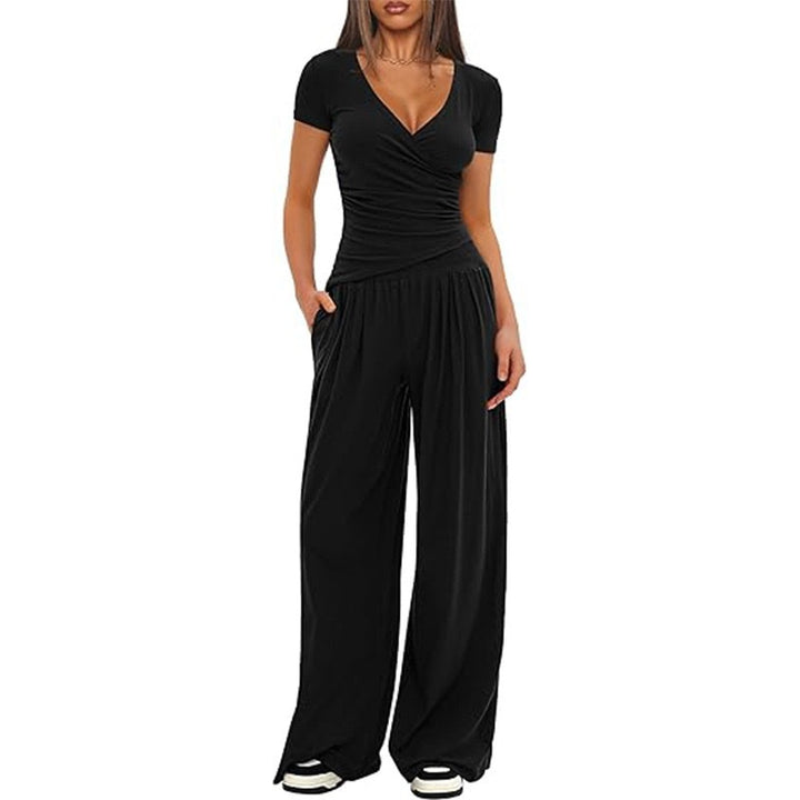 Dame avslappet jumpsuit med omslagsdesign og vid ben Skjora