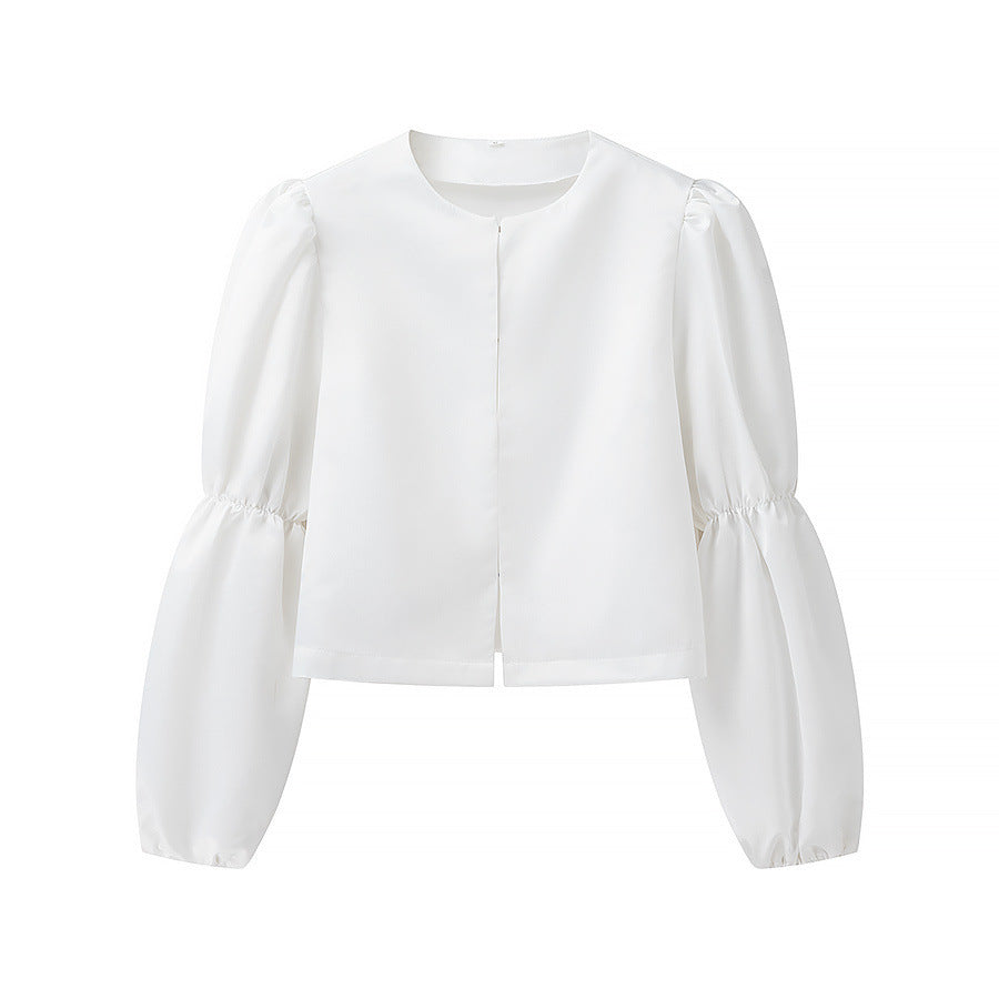 Kvinnens elegant skreddersydde bluse med voluminøse ermer Skjora