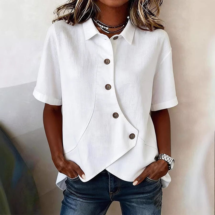Dame spesielt designet bluse med unike knapppanel Skjora