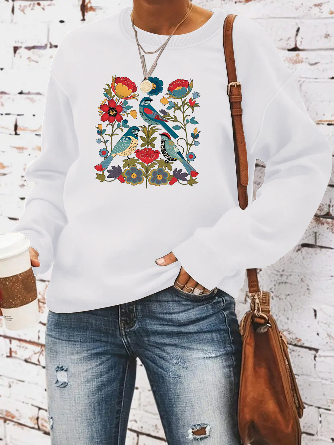 Damegenser med blomsterfuglmotiv og casual snitt Skjora