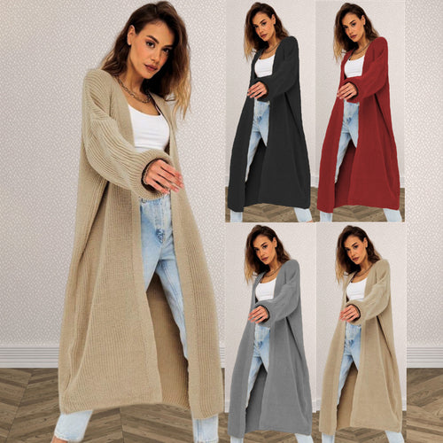 Kvinnens chunky strikk cardigan med åpen frontdesign og dype lommer Skjora