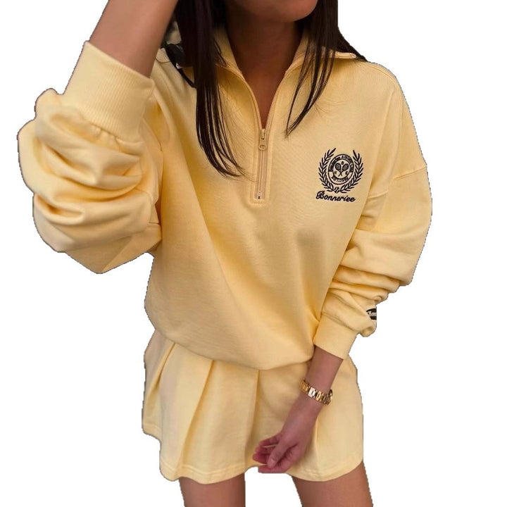 Dame sporty zip genser med avslappet snitt og broderi Skjora