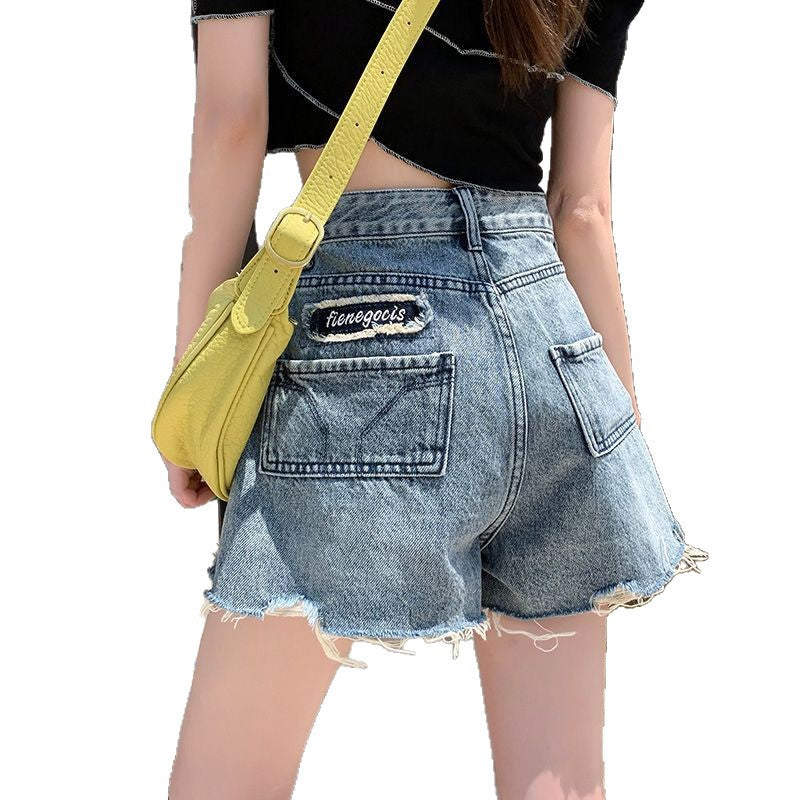 Dame denim shorts med frynsetermer og unikt broderidetalj Skjora