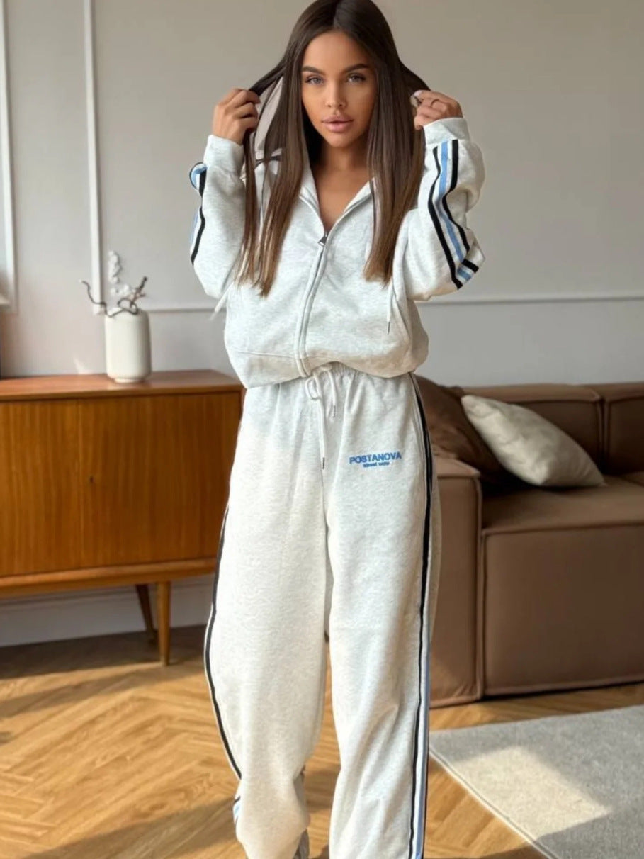 Kvinnenes sporty fritidssett med casual zip hettegenser og komfortable joggebukser Skjora
