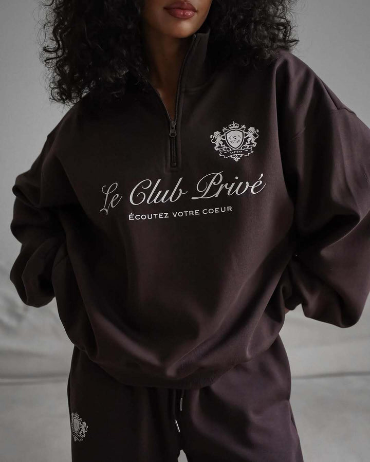 Dame avslappet genser med halvlukking og eksklusivt trykk Skjora