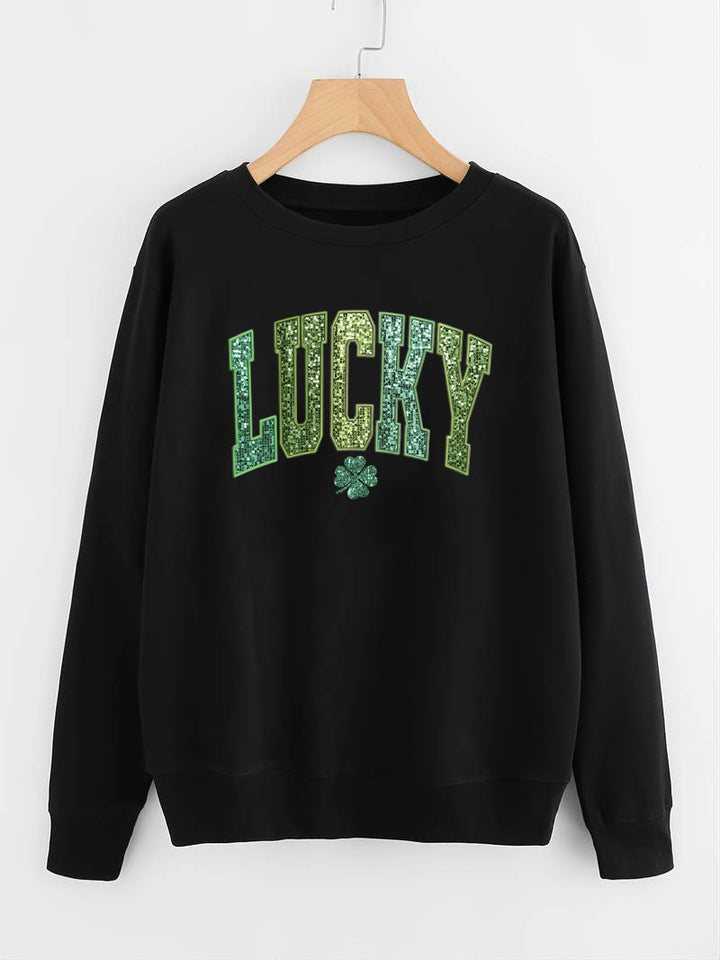 Dame uformell sweatshirt med glitrende skrift og firkløvermotiv Skjora