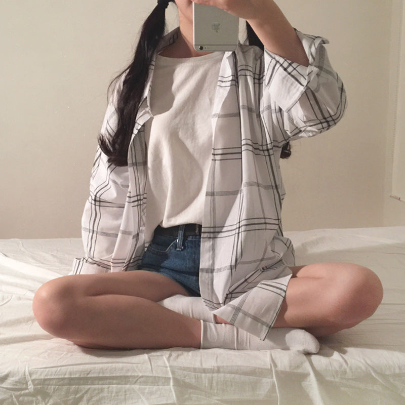 Dame stripete overskjorte bluse i en avslappet fasong med oversized ermer