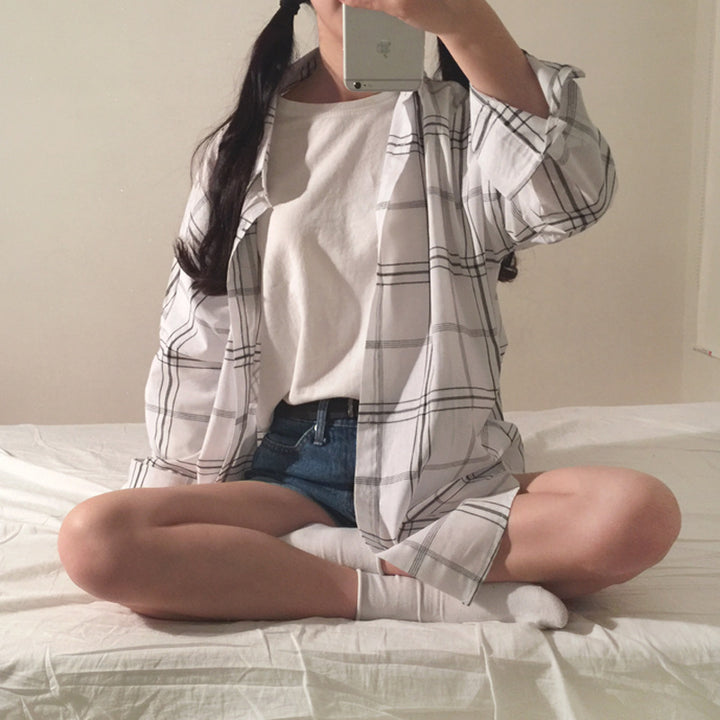Dame stripete overskjorte bluse i en avslappet fasong med oversized ermer