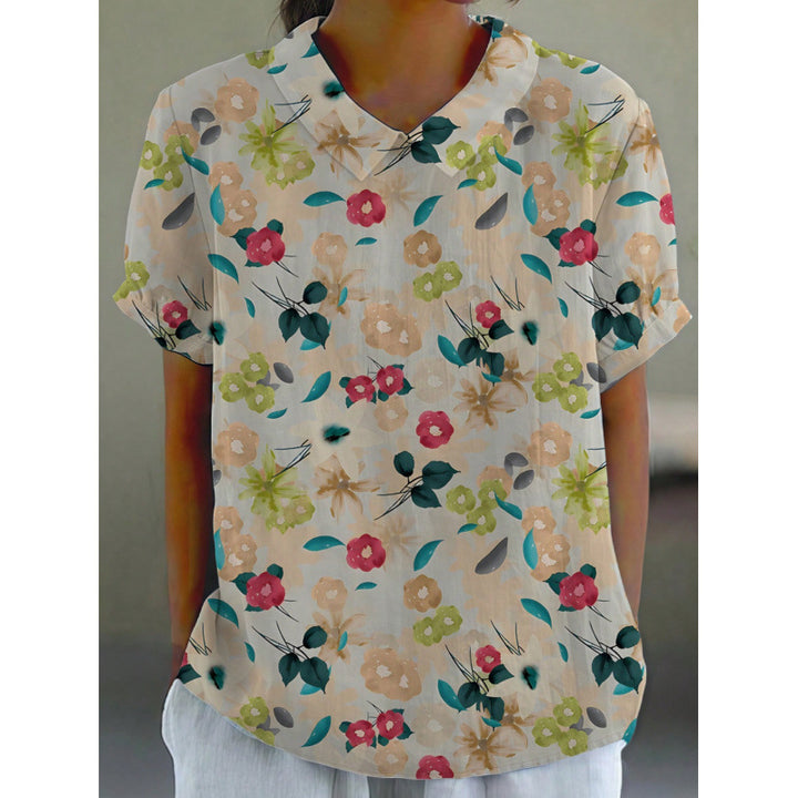 Dame kortermet bluse med florale accenter og klassisk krage Skjora