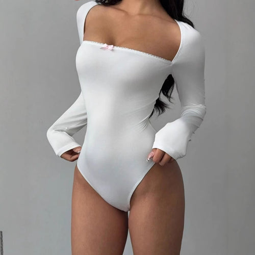 Dame Figurtiltende Langermet Bodysuit med elegant utringning Skjora