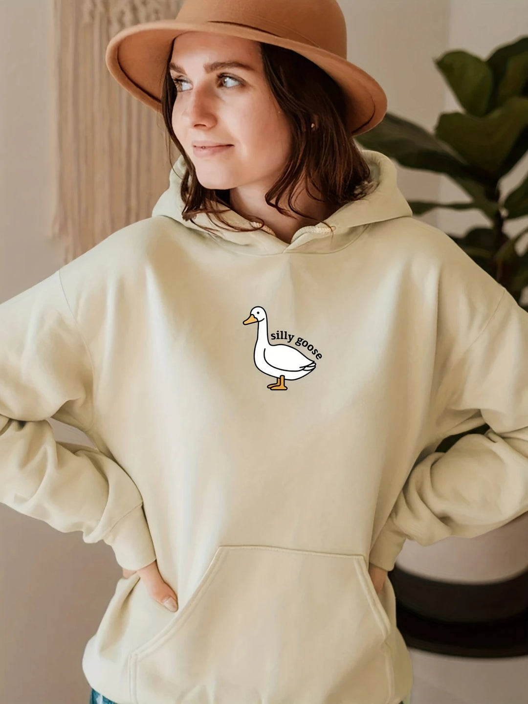 Women's hoodie with a creative goose motif and soft fleece interior Skjora