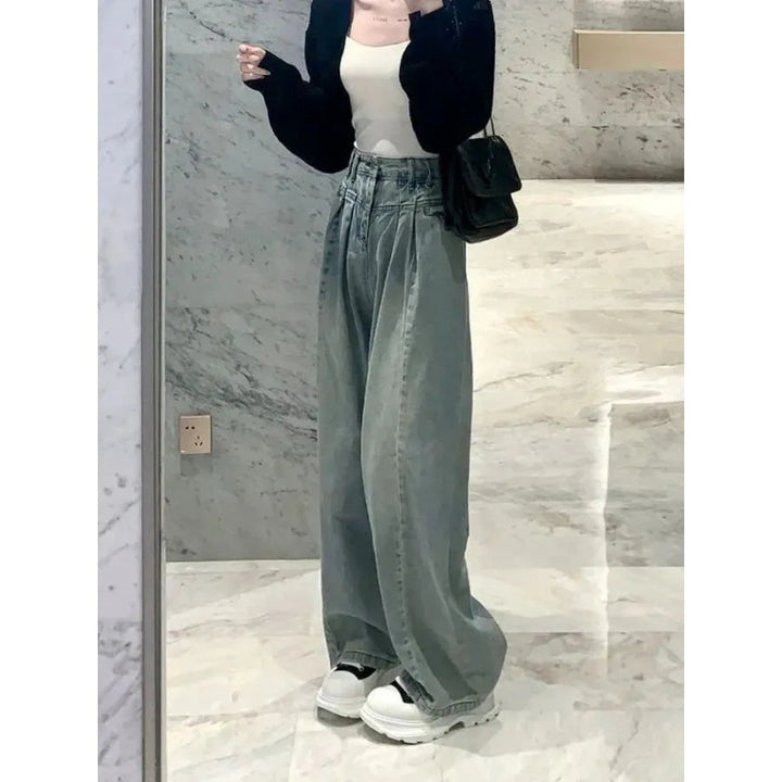 Kvinners vide høytekkede jeans med elegant midjebånddesign Skjora