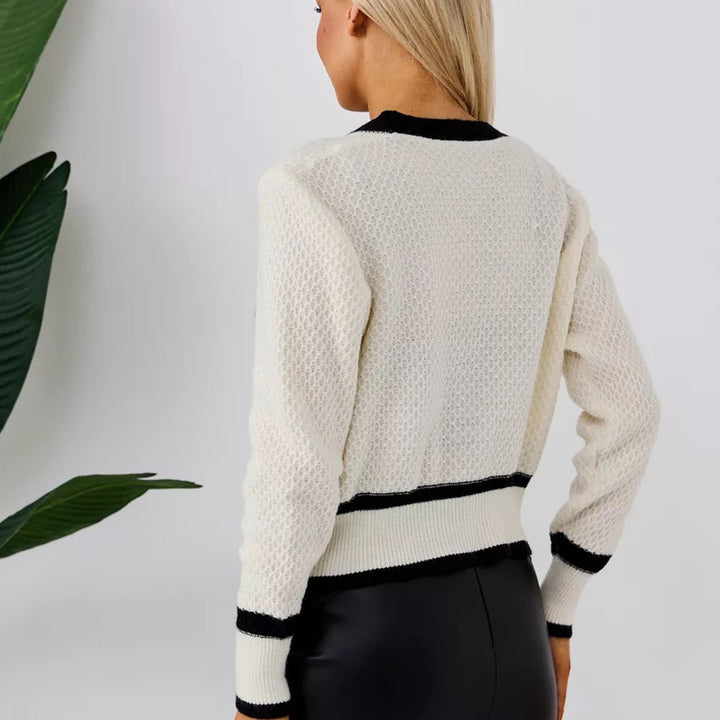 Kvinnelig moteriktig cardigan med elegante perleknapper og lommer Skjora
