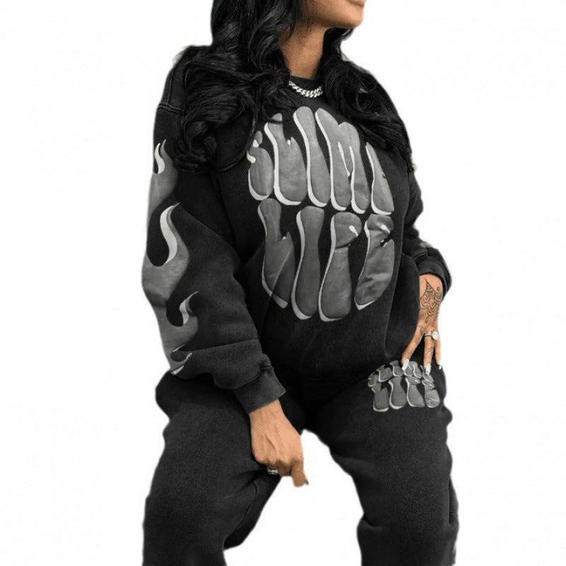Kvinne tracksuit med trendy grafisk design og sporty passform Skjora