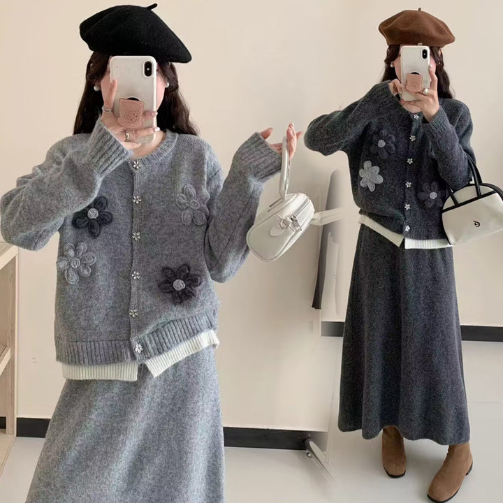 Dame cardigan med blomsterapplikasjoner og maxiskjørt Skjora