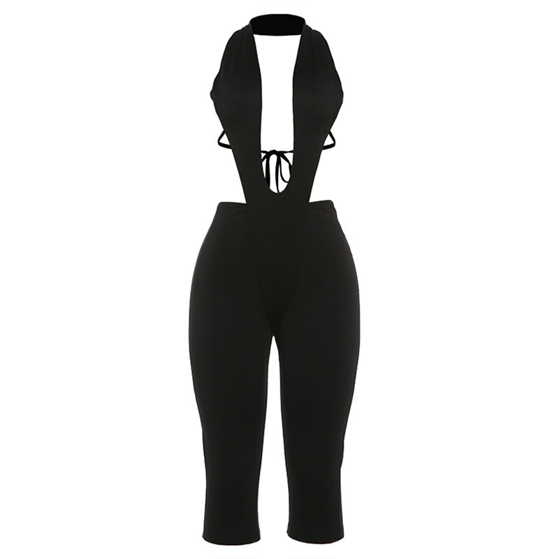 Damer figurnoende jumpsuit med dyp V-hals og belte