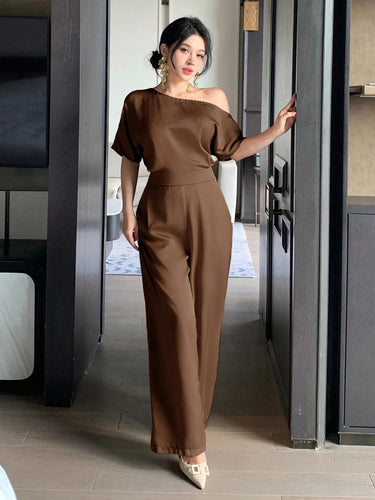 Dame One Shoulder Jumpsuit med vid ben og elegant snitt Skjora