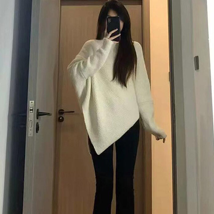Kvinnes oversized strikket genser med asymmetrisk kutt og fin ribbestruktur Skjora