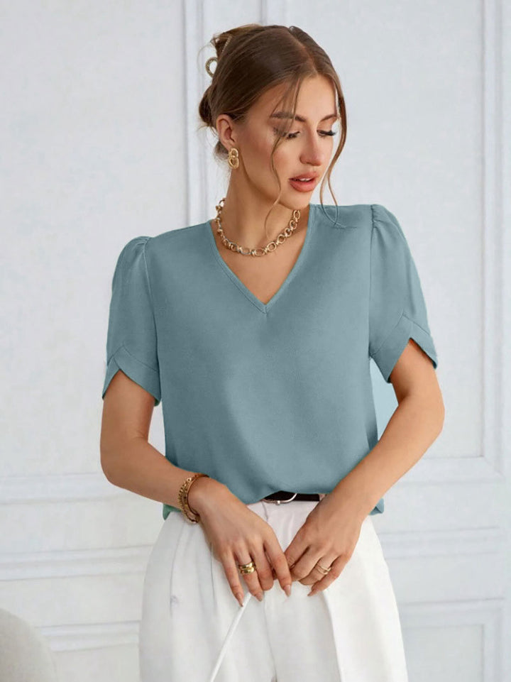 Damer V-halsbluse med puffermede