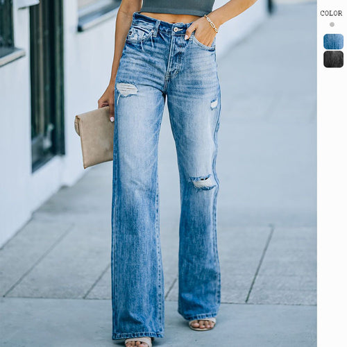 Kvinnelige vidde jeans med slitte effekter og høy liv