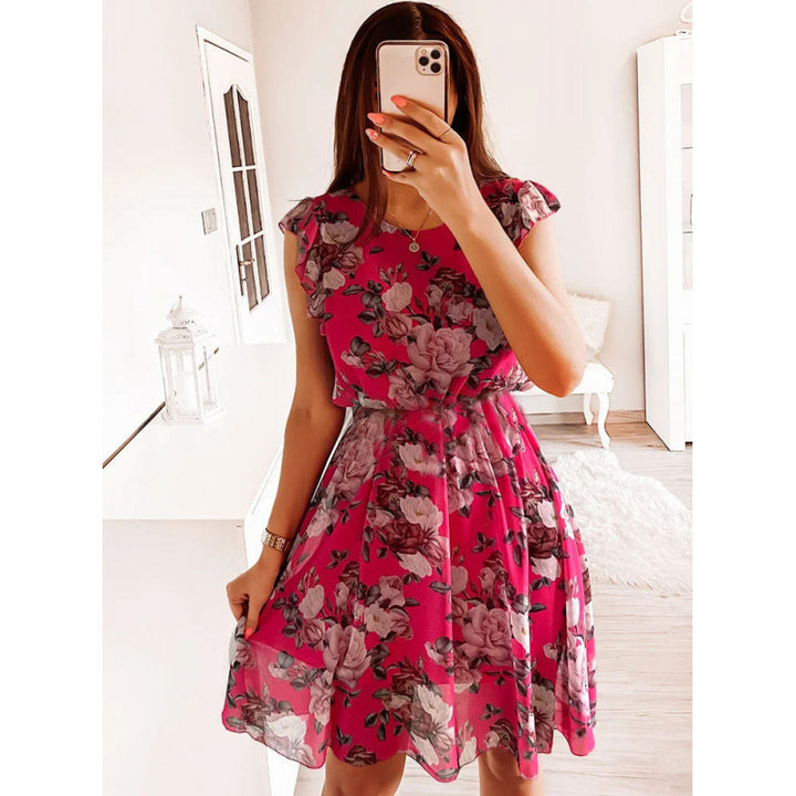 Dame sommerkjole med blomstertrykk, volangdetaljer og belte i midjen Skjora