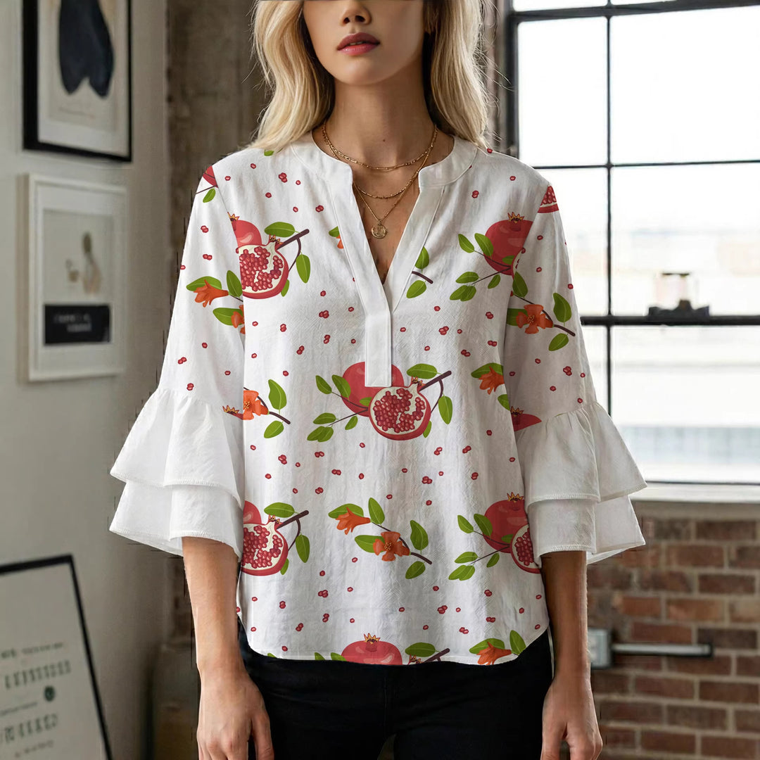 Dame bluse med voluminøse rysjermer og moderne motiv Skjora