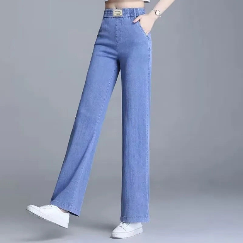 Kvinne Loose Jeans med Elastisk Liv og Praktiske Lommer Skjora