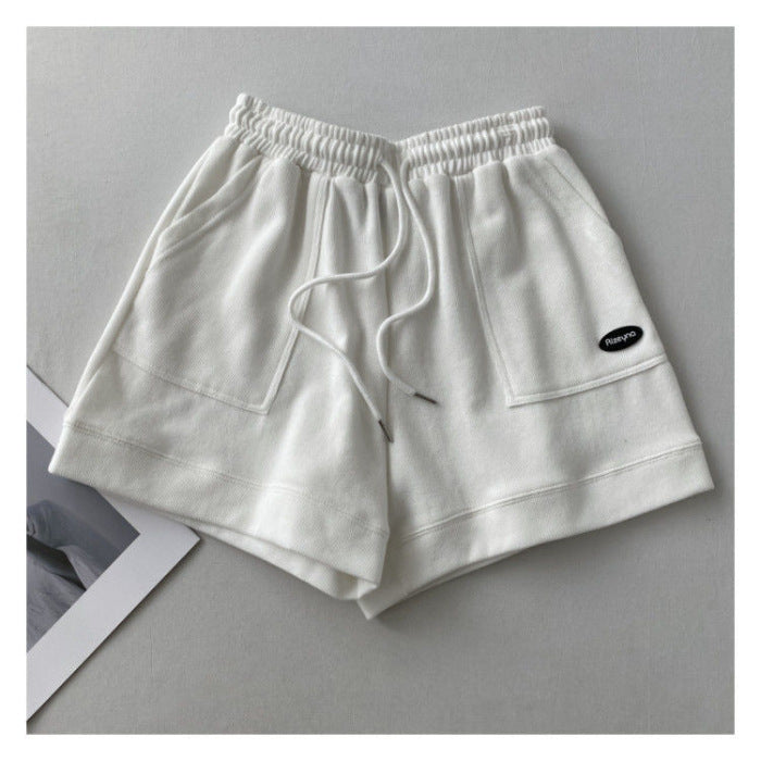 Kvinnenes casual joggeshorts med elastisk liv og praktiske sidelommer