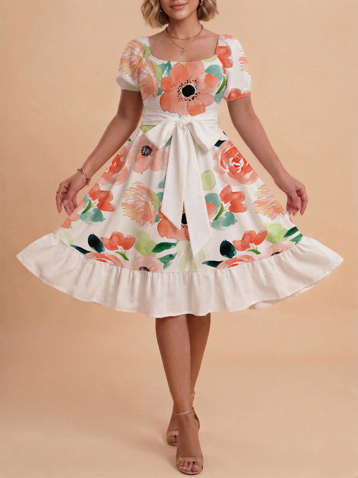 Damen Sommerliches Blumenkleid mit taillierbarem Gürtel und voluminösen Ärmeln Skjora