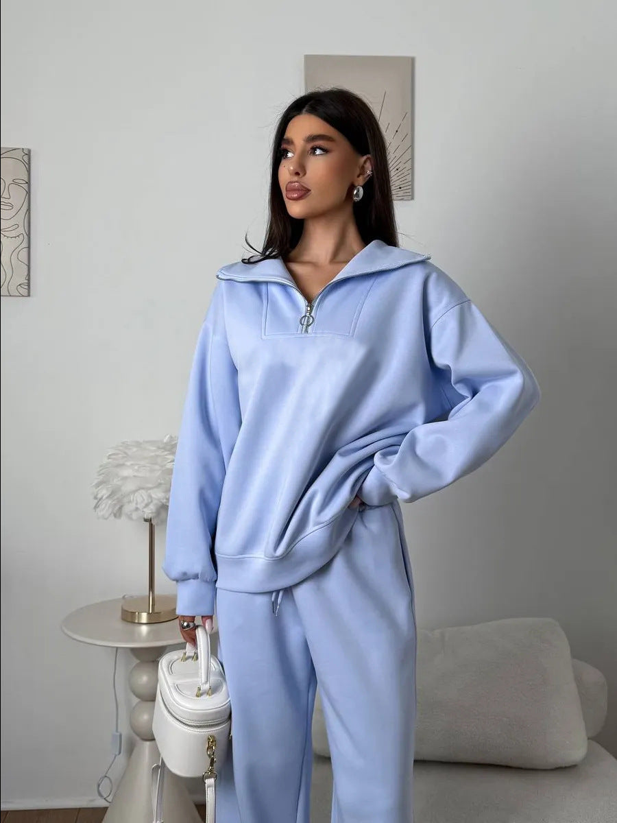 Kvinnens elegante fleece treningsoverall med høy krage og praktisk glidelås