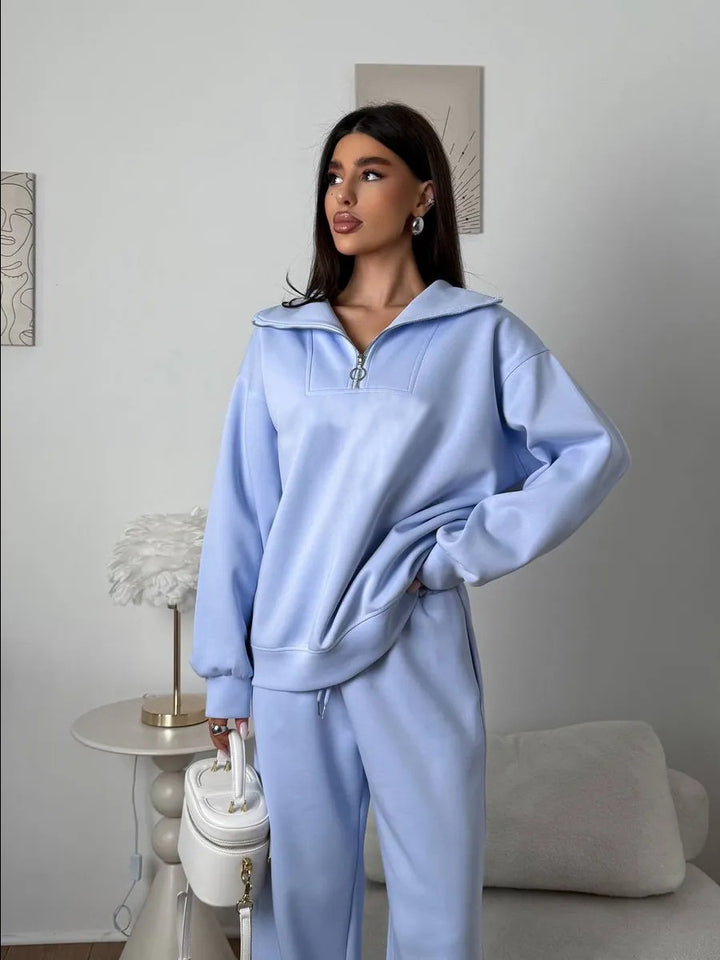 Kvinnens elegante fleece treningsoverall med høy krage og praktisk glidelås