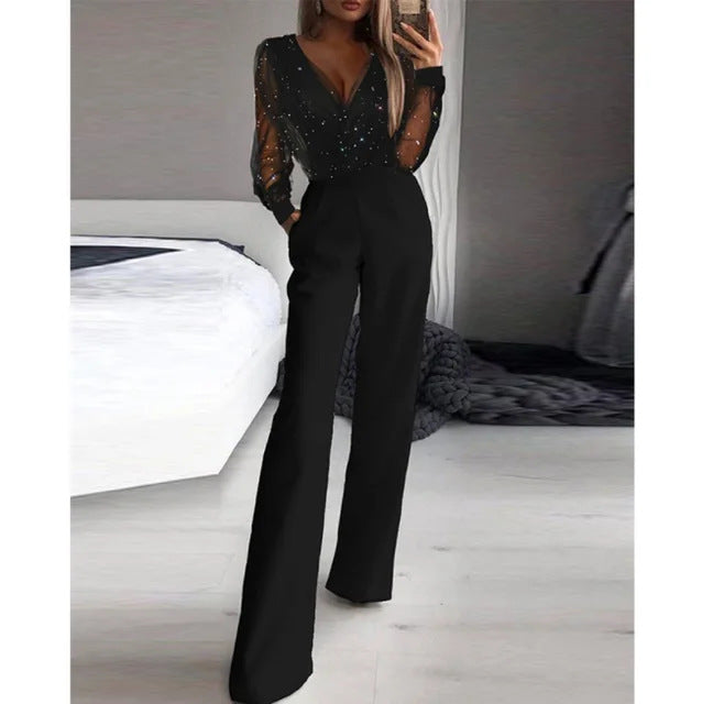 Damer Elegant Jumpsuit med Transparent Bluse og Glitrende Akcenter Skjora