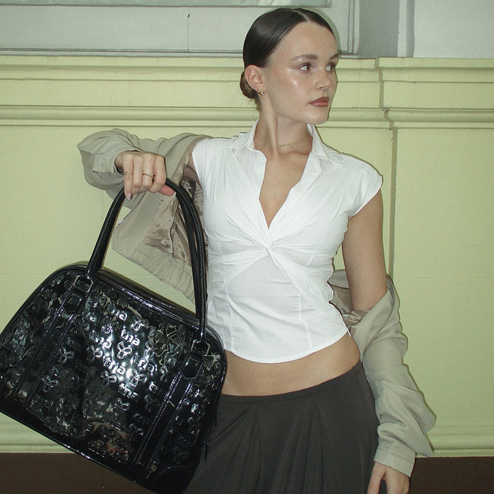 Dame elegant kortermet bluse med knuteformet design Skjora