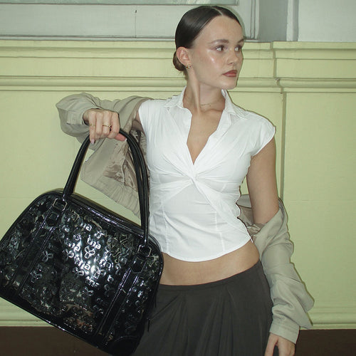 Dame elegant kortermet bluse med knuteformet design Skjora