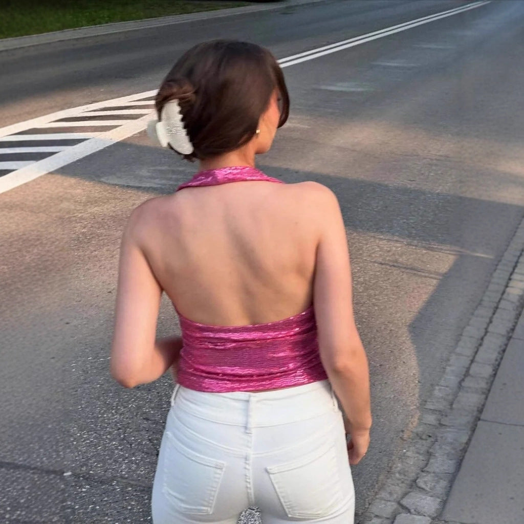 Dame ryggløs topp med dyp V-hals og raffinerte volangdetaljer Skjora