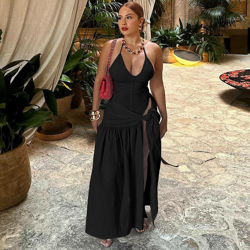 Dame Maxi-kjole med elegant omslagsdesign og sidedelt slit Skjora