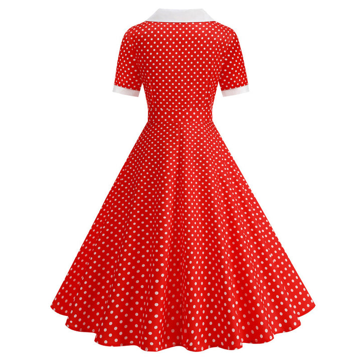 Dame Vintage Polka-Dot Kjole med knappdetaljer og svajende skjørt Skjora