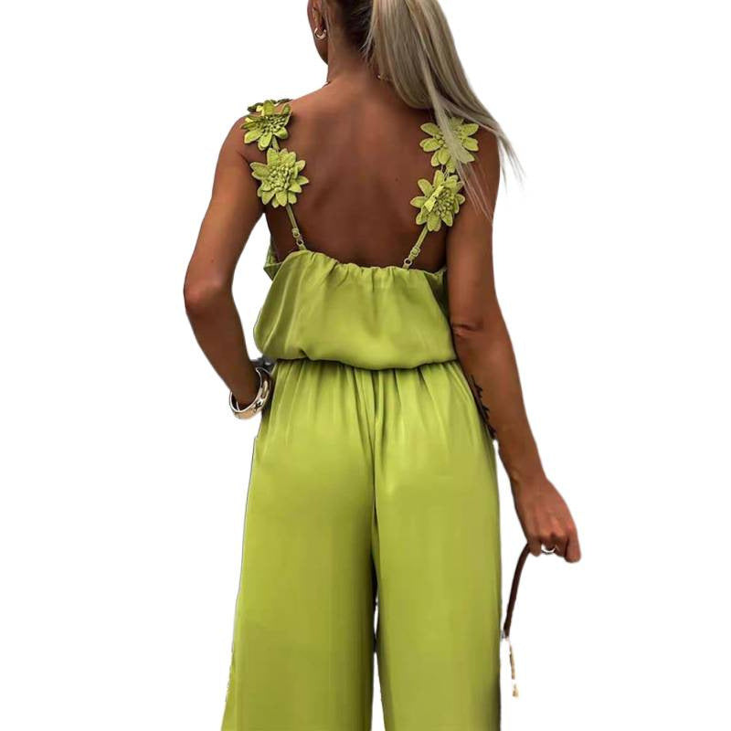 Dame jumpsuit med blomstrete volanger og vide ben Skjora