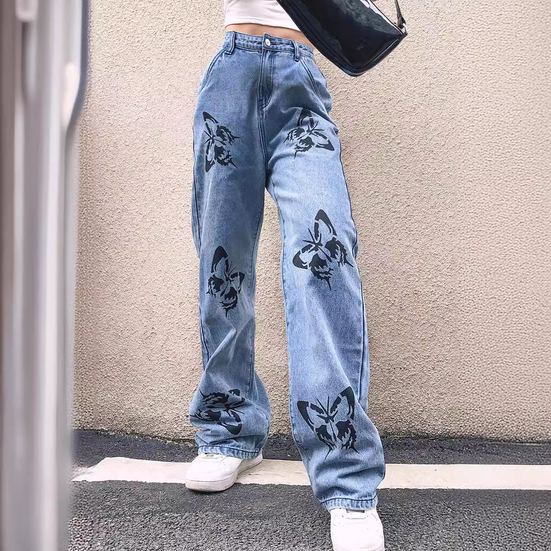 Dame vide jeans med iøynefallende sommerfugltrykk Skjora