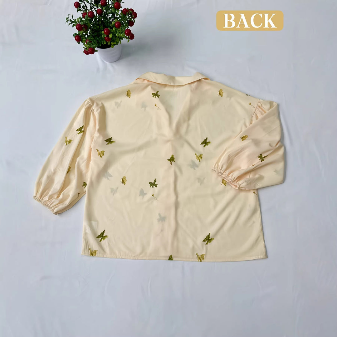 Damebluse med volangdetaljer og blomsterbroderi Skjora