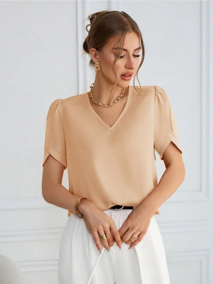 Damer V-halsbluse med puffermede