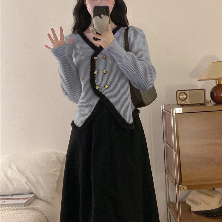 Kvinnelig elegant cardigan med kontrasterende kant og knappedetaljer Skjora