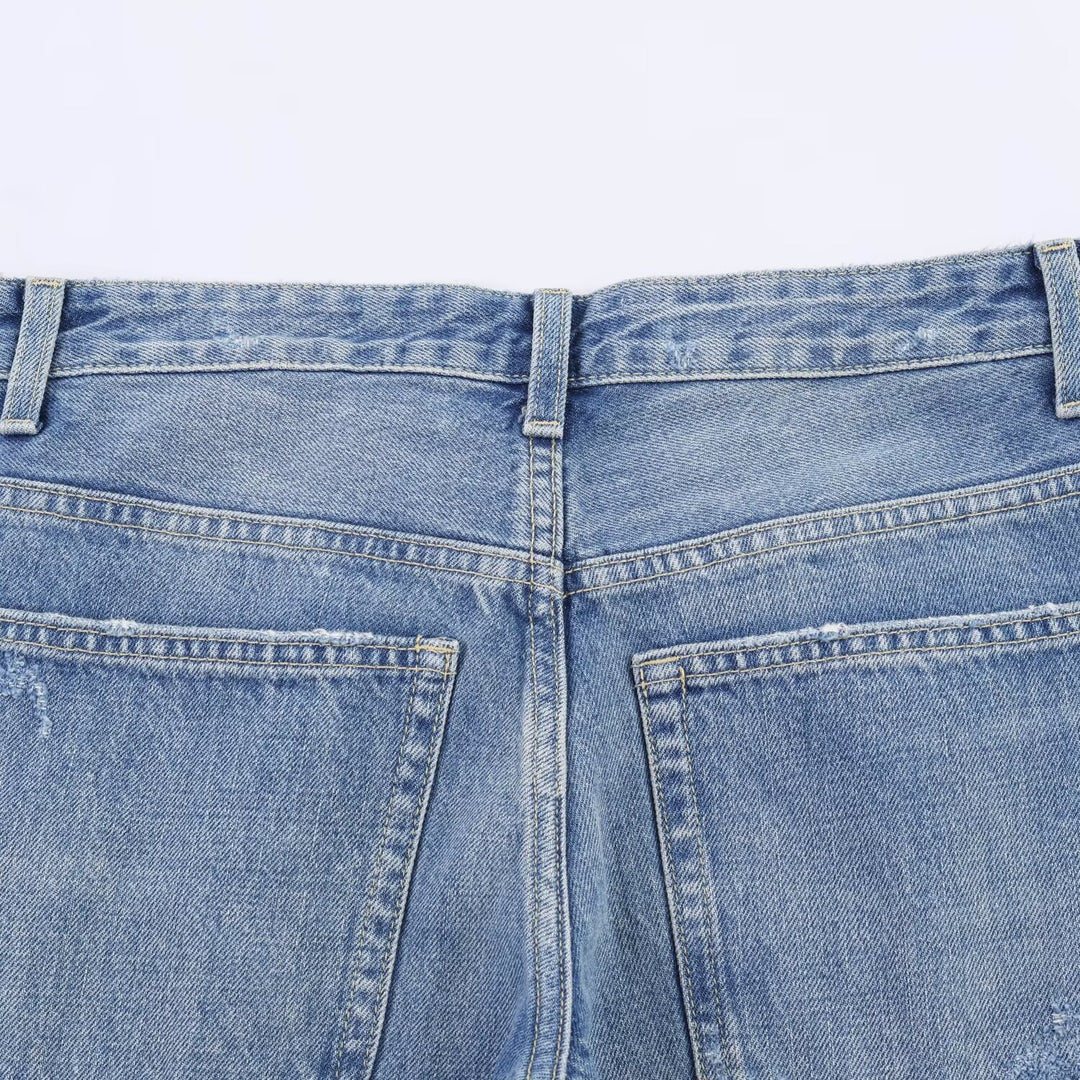 Dame Flared Jeans med ødelagte effekter og frynseavslutninger Skjora