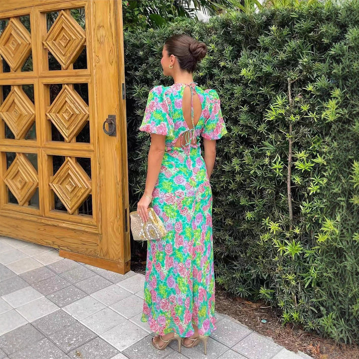 Kvinnens maxi kjole med romantisk blomsterdesign og flytende snitt Skjora