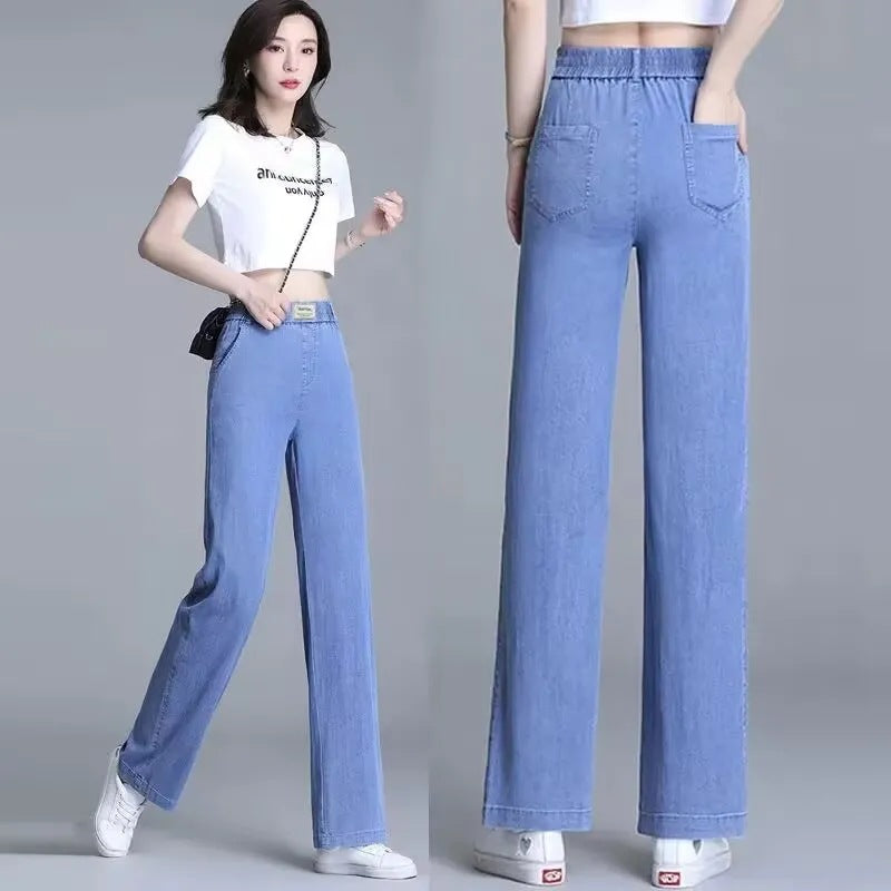 Kvinne Loose Jeans med Elastisk Liv og Praktiske Lommer Skjora