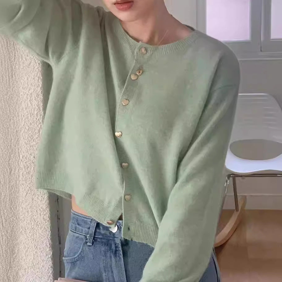 Kvinne Elegant Cardigan med Hjerteknapper og Fin Ribbestruktur Skjora