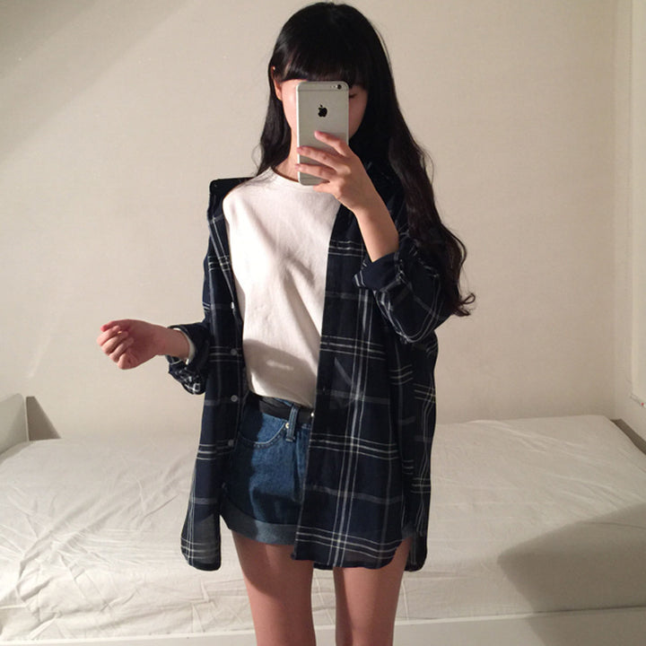 Dame stripete overskjorte bluse i en avslappet fasong med oversized ermer
